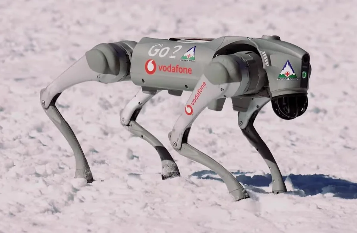 Side view of a Unitree Go2 quadruped robot showing its leg joints