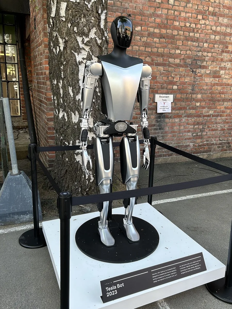 Tesla Bot, the earlier Optimus prototype, on display in 2023