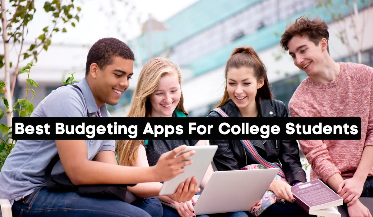 Group of college students sitting outdoors, smiling and using a tablet and laptop to explore budgeting apps.