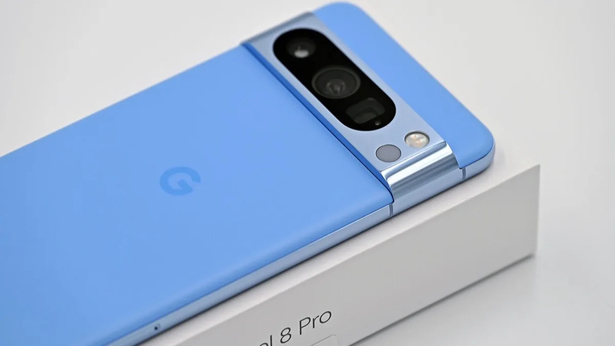 Google Pixel 8 Pro in blue resting on its retail box, one of the phones receiving the August 2026 Android 17 update