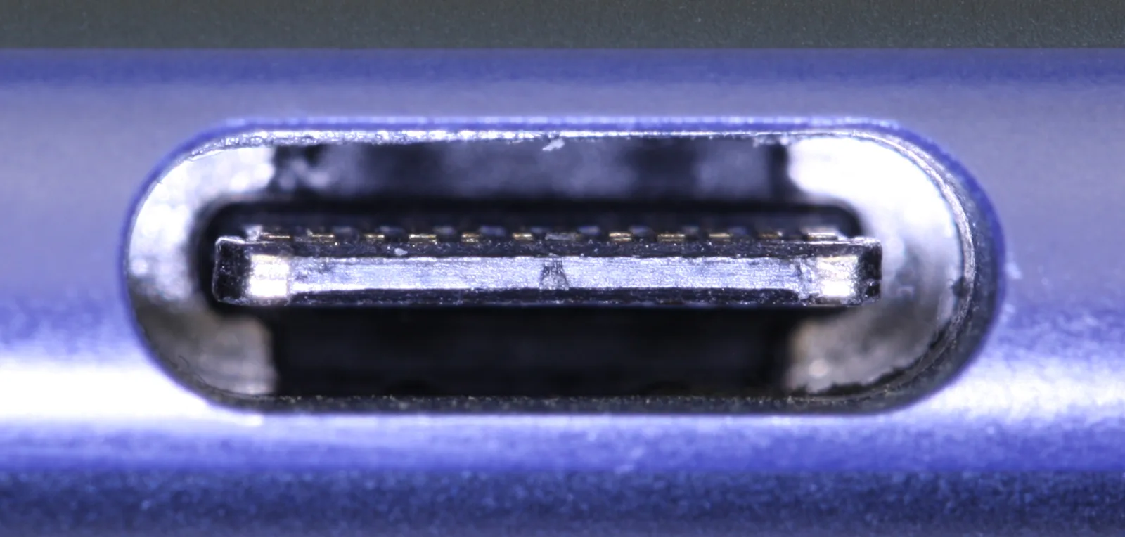 Close-up of a USB-C charging port on an Android phone