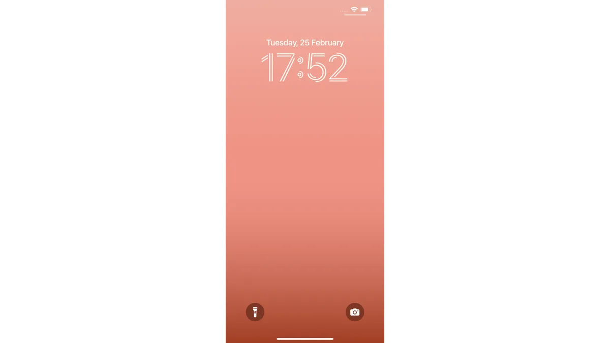 An iPhone lock screen showing the time and date, representative of where Apple's threat notifications now appear