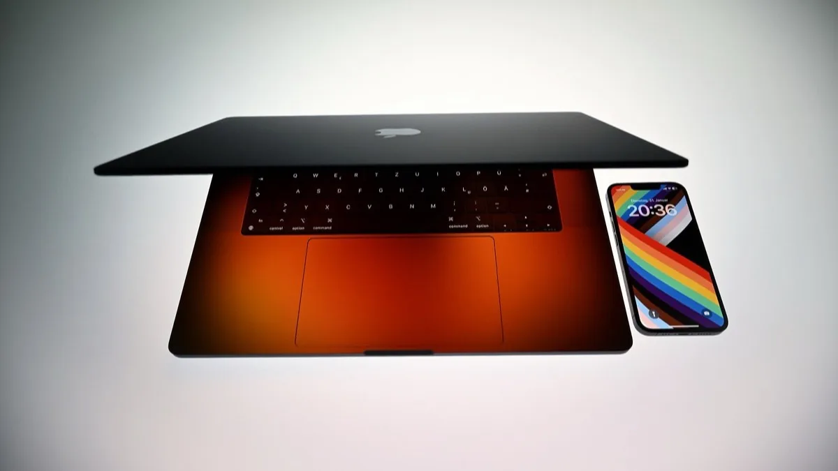 A MacBook Pro and an iPhone photographed together, the two device families that gained the most trade-in credit