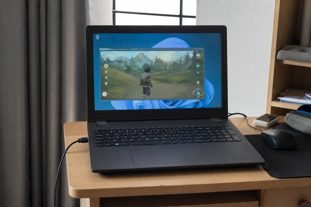 Older laptop on a small desk running Android in a window