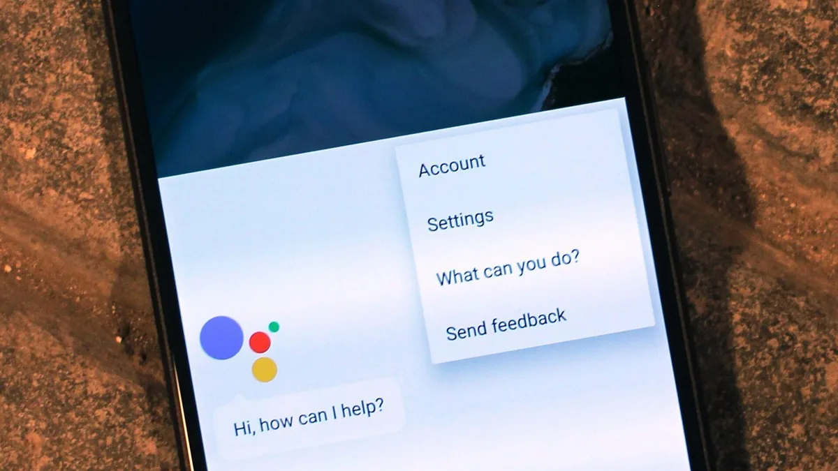Google Assistant open on a Google Pixel phone screen showing the Account and Settings menu
