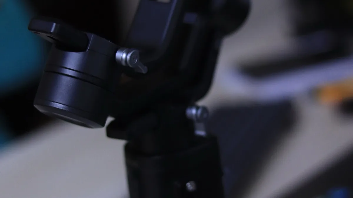 Close-up of a mechanical camera gimbal's stabilized joint, illustrating the kind of hardware stabilization built into Honor's new phone camera