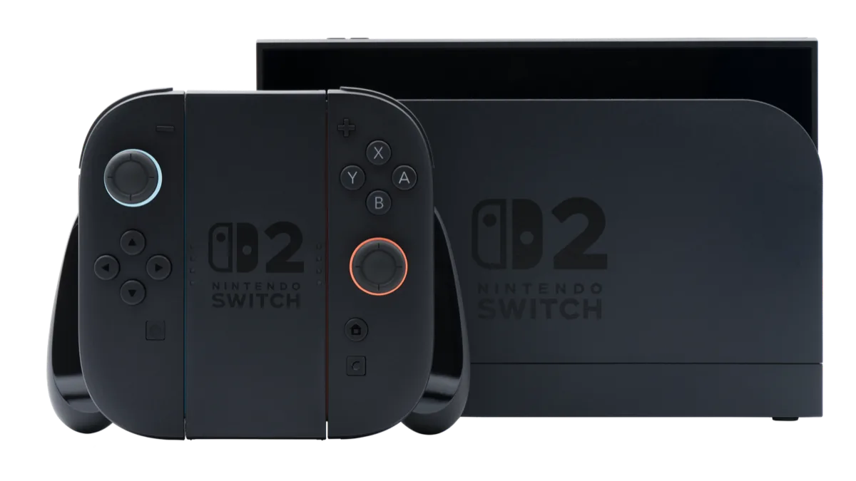 A black Nintendo Switch 2 console sitting in its dock beside a pair of Joy-Con 2 controllers in a grip