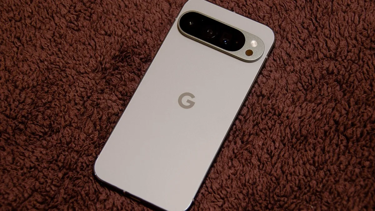 The back of a Google Pixel phone showing its triple camera bar, used to illustrate the Pixel 11's new modem hardware