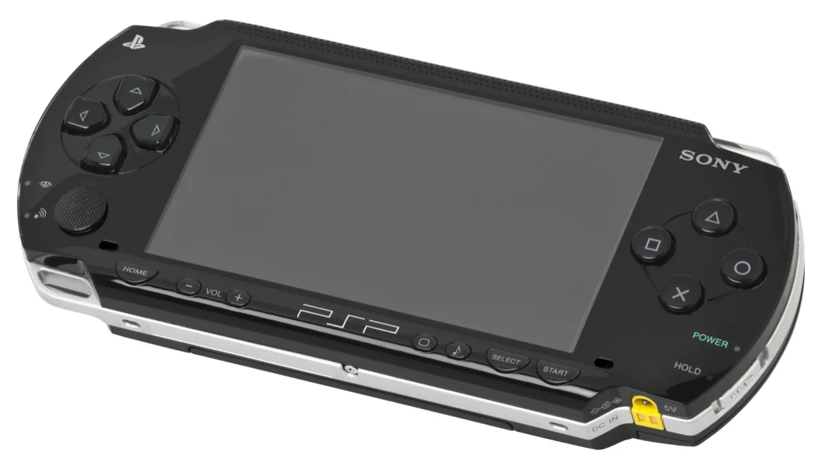 A Sony PSP-1000 handheld, the console whose UMD games run on PPSSPP for Android