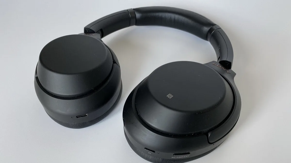 Sony 1000X-series over-ear noise-cancelling headphones with the earcups folded flat