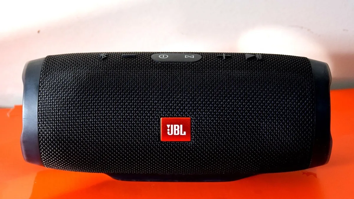 A black JBL wireless speaker with the JBL logo, illustrating the brand's speaker lineup