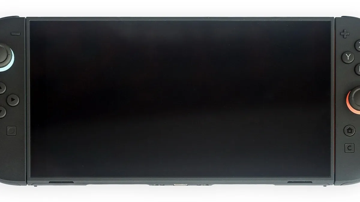 A Nintendo Switch 2 in handheld mode with its Joy-Con 2 controllers attached and the screen switched off
