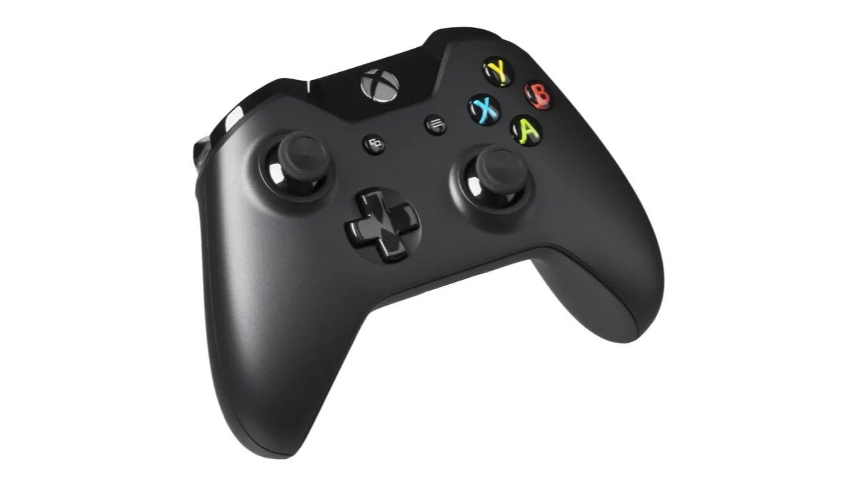 A black Xbox One wireless controller photographed at an angle against a plain white background