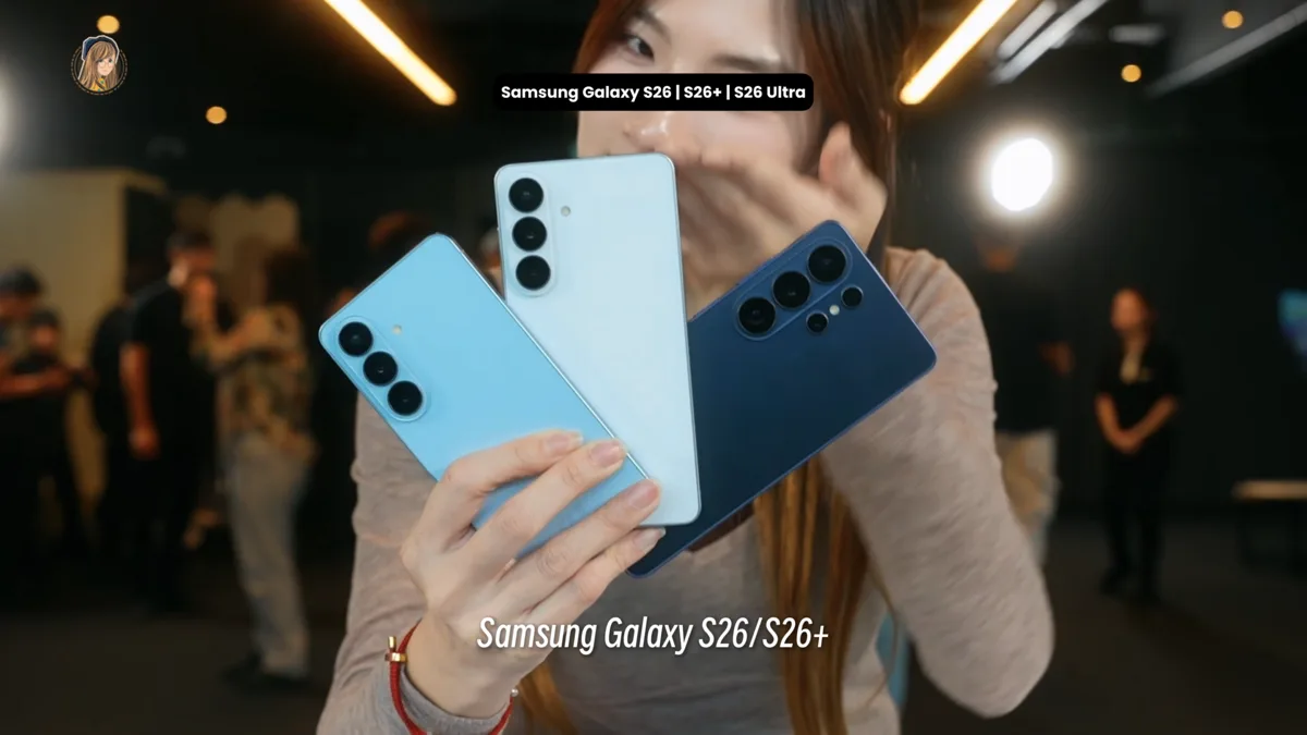 Samsung Galaxy S26, Galaxy S26+ and Galaxy S26 Ultra held fanned out in one hand, rear cameras facing the camera